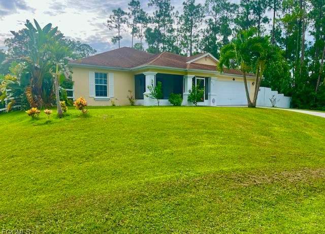 Property at 822 Johns Ave, Lehigh Acres, FL 33972, 3 beds, 2 baths