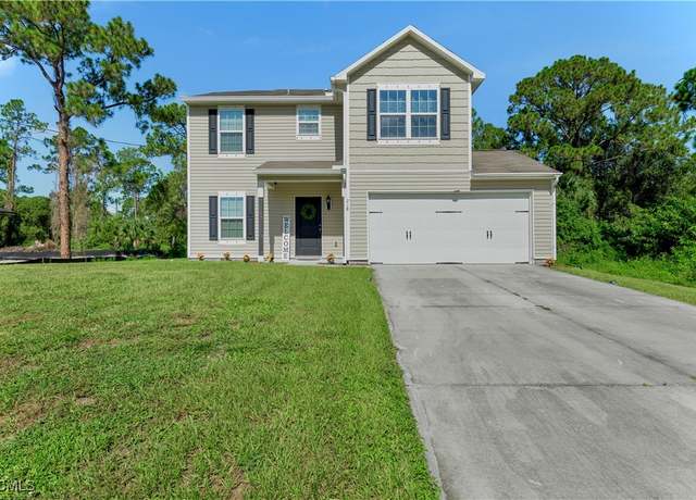 Property at 218 Lomax Ave S, Lehigh Acres, FL 33974, 3 beds, 2.5 baths