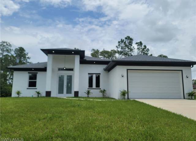 Property at 1102 W 11th St, Lehigh Acres, FL 33972, 4 beds, 3 baths