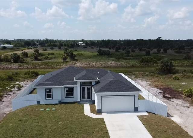 Property at 951 Commodore St, Lehigh Acres, FL 33974, 3 beds, 2 baths