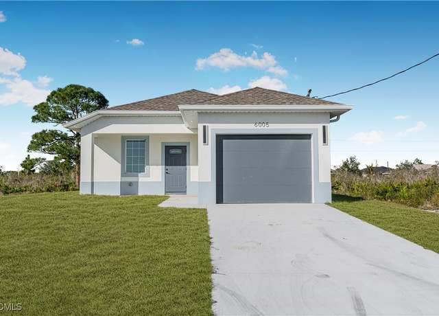 Property at 6005 June Ave N, Lehigh Acres, FL 33971, 3 beds, 2 baths