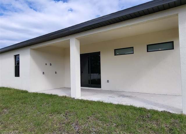 Property at 1901 Wanda Ave N, Lehigh Acres, FL 33971, 3 beds, 2 baths