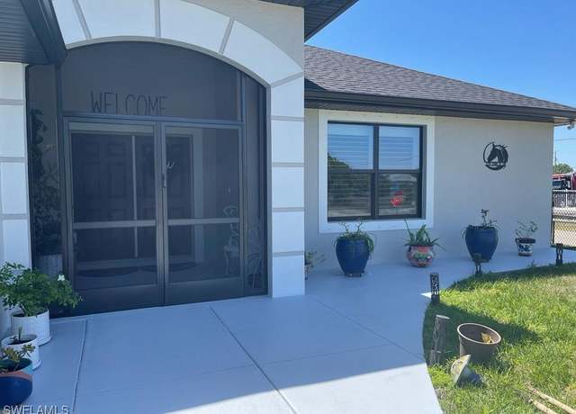 Property at 3219 32nd St SW, Lehigh Acres, FL 33976, 3 beds, 2 baths