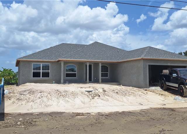 Property at 2424 NE 7th Ave, Cape Coral, FL 33909, 3 beds, 2 baths