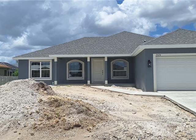 Property at 2424 NE 7th Ave, Cape Coral, FL 33909, 3 beds, 2 baths