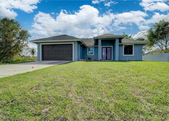 Property at 2911 10th St SW, Lehigh Acres, FL 33976, 3 beds, 2 baths