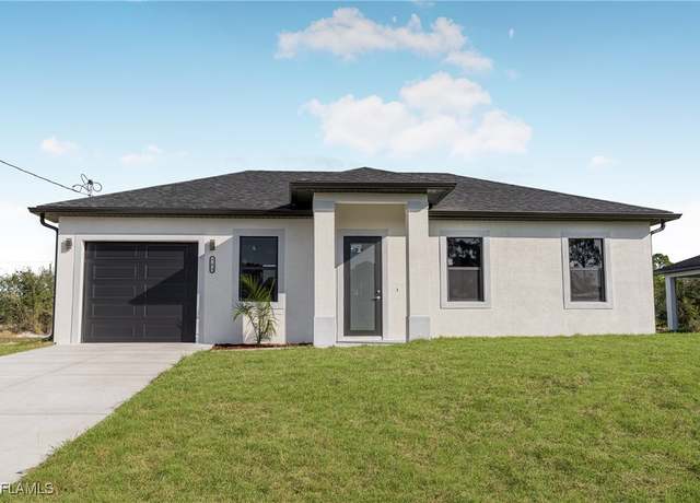 Property at 543 Trinity St E, Lehigh Acres, FL 33974, 3 beds, 3 baths