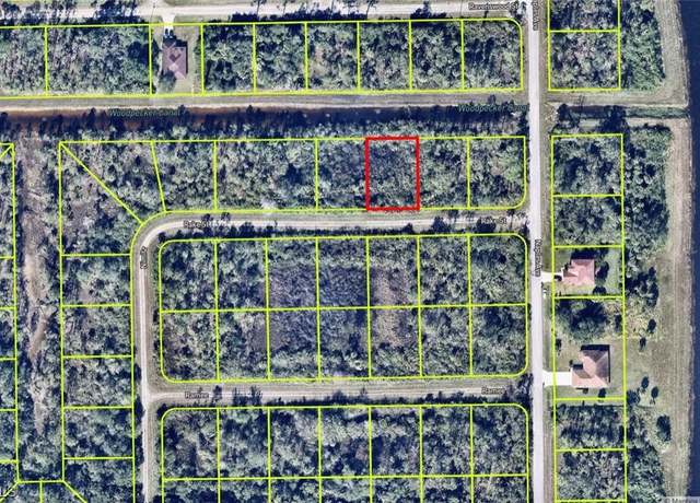 Property at 1243 Rake St E, Lehigh Acres, FL 33974