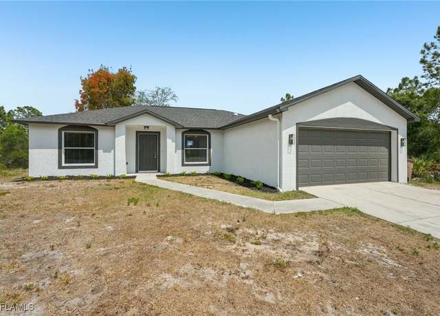Property at 406 Leroy Ave, Lehigh Acres, FL 33972, 3 beds, 2 baths