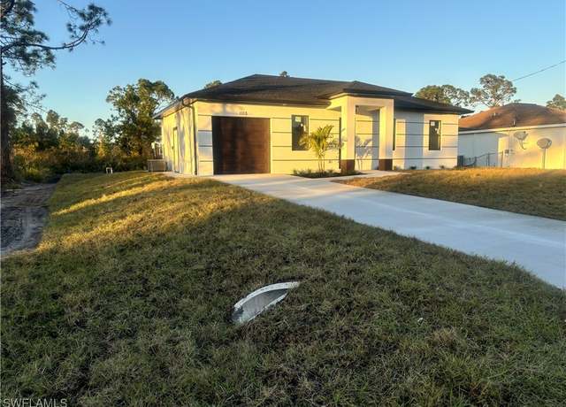 Property at 1115 Cumming St E, Lehigh Acres, FL 33974, 3 beds, 3 baths