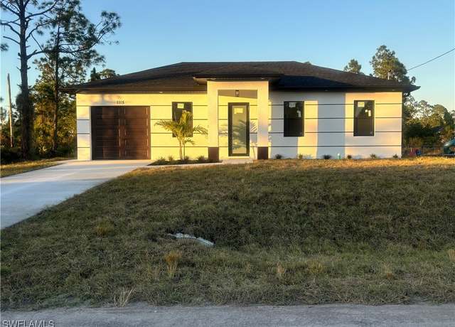 Property at 1115 Cumming St E, Lehigh Acres, FL 33974, 3 beds, 3 baths