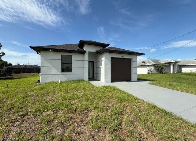Property at 1146 Ecrue St E, Lehigh Acres, FL 33974, 3 beds, 2 baths