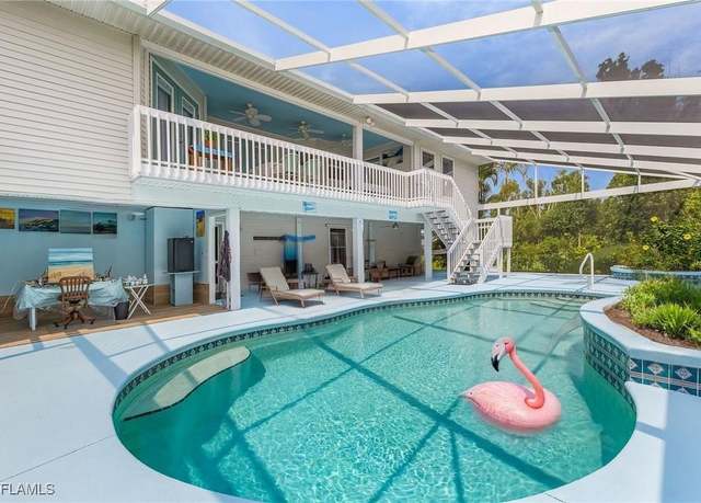 Property at 10800 Habitat Cir, Bokeelia, FL 33922, 3 beds, 2 baths