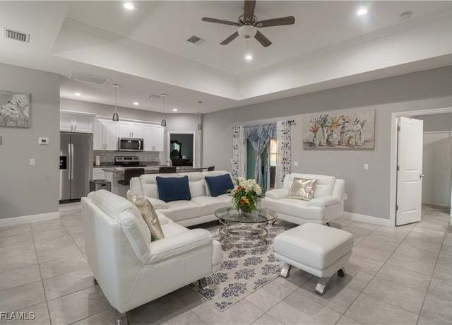 Property at 1305 Sunniland Blvd, Lehigh Acres, FL 33971, 4 beds, 3 baths