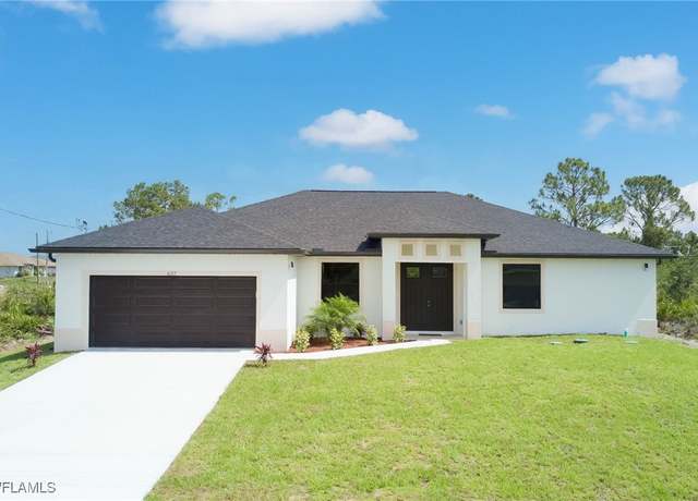 Property at 637 Cardinal St E, Lehigh Acres, FL 33974, 4 beds, 3 baths