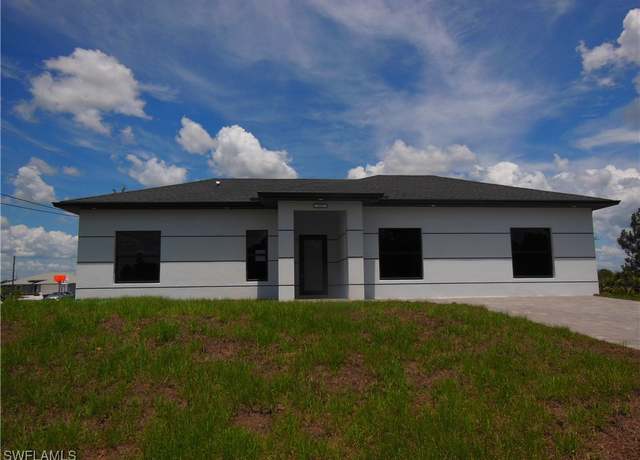 Property at 821 Bell Blvd S, Lehigh Acres, FL 33974, 3 beds, 2 baths
