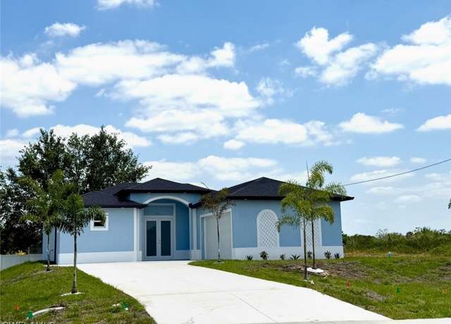 Property at 900 Sunniland Blvd W, Lehigh Acres, FL 33971, 4 beds, 2 baths