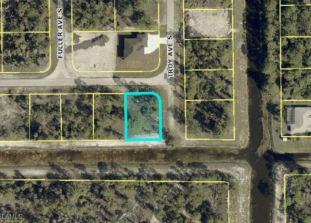Property at 660 Ames St E, Lehigh Acres, FL 33974