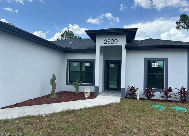 Property at 2520 74th St W, Lehigh Acres, FL 33971, 3 beds, 2.5 baths