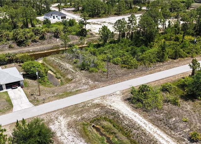 Property at 1037 Kellogg St E, Lehigh Acres, FL 33974
