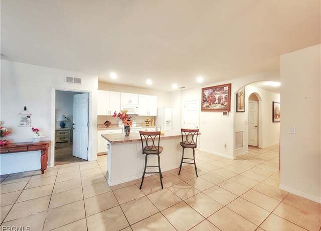 Property at 8330 Tortoise Isle Ct, Lehigh Acres, FL 33972, 3 beds, 2 baths