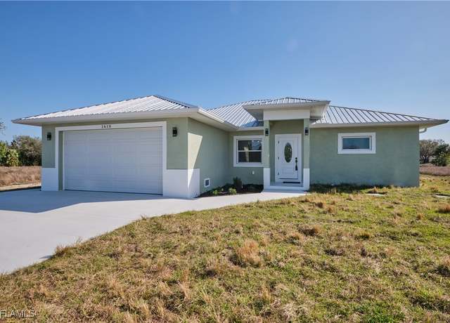 Property at 1610 Robert Ave, Lehigh Acres, FL 33972, 3 beds, 2 baths