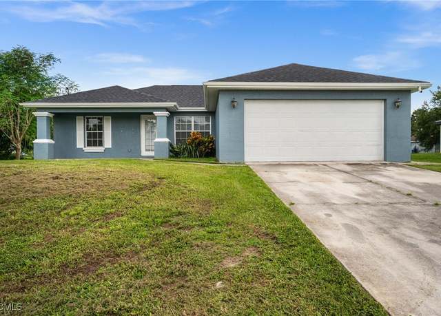 Property at 2611 4th St SW, Lehigh Acres, FL 33976, 4 beds, 3 baths