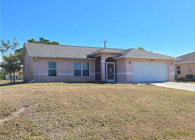 Property at 2419 NE 23rd Ave, Cape Coral, FL 33909, 3 beds, 2 baths