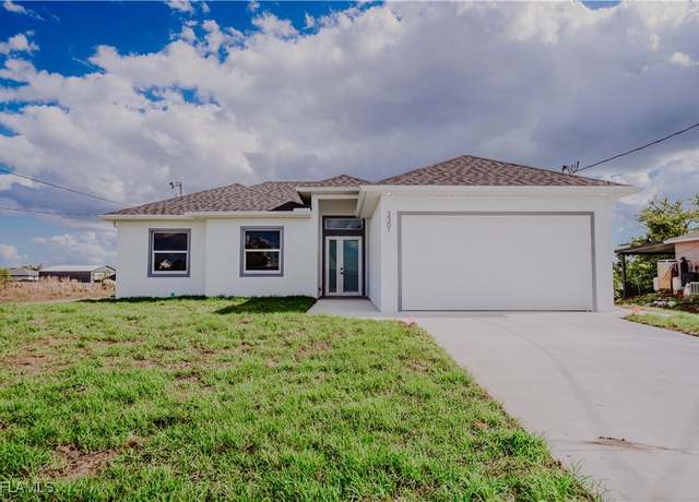 Property at 3301 30th St SW, Lehigh Acres, FL 33976, 3 beds, 2 baths