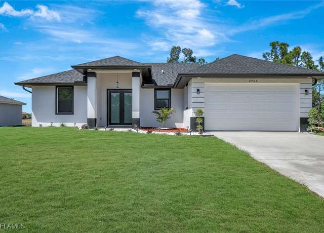 Property at 2706 28th St SW, Lehigh Acres, FL 33976, 3 beds, 2 baths