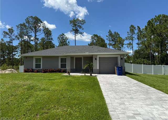 Property at 702 W 13th St, Lehigh Acres, FL 33972, 3 beds, 2 baths