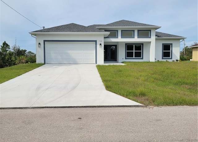 Property at 734 Chapman Ave S, Lehigh Acres, FL 33974, 3 beds, 2 baths
