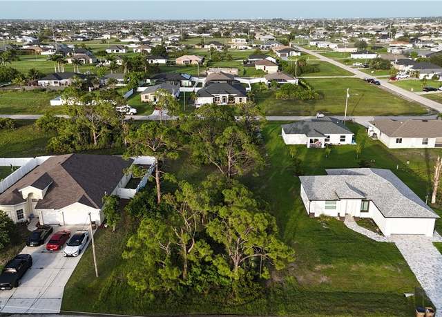 Property at 409 NW 26th Pl, Cape Coral, FL 33993