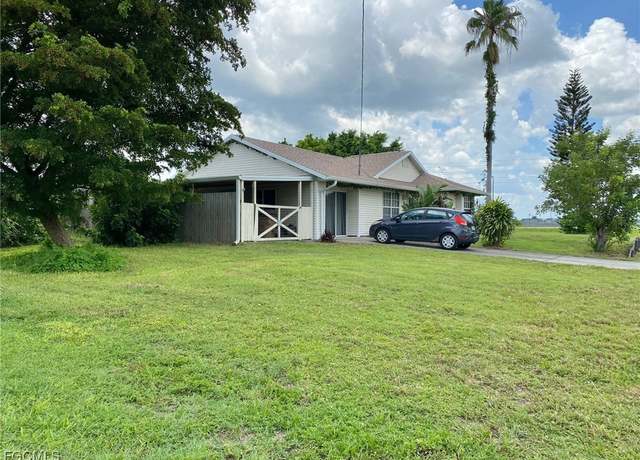 Property at 705 Jack Ave N, Lehigh Acres, FL 33971, 3 beds, 2 baths