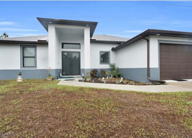 Property at 821 Greenwood Ave, Lehigh Acres, FL 33972, 3 beds, 2 baths