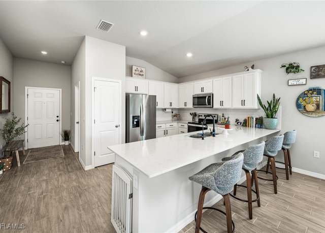 Property at 2112 NE 4th Pl, Cape Coral, FL 33909, 4 beds, 2 baths