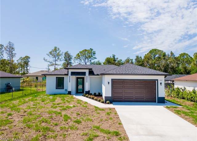 Property at 3007 35th St SW, Lehigh Acres, FL 33976, 3 beds, 2 baths