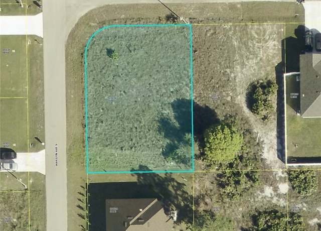 Property at 1212 Eburn St E, Lehigh Acres, FL 33974