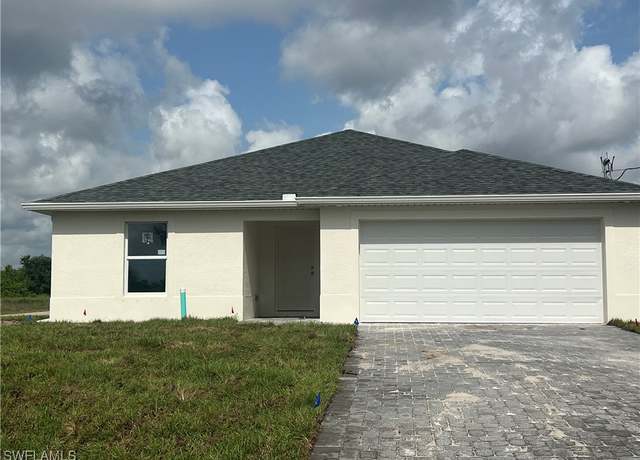 Property at 658 Ivanhoe Ave S, Lehigh Acres, FL 33974, 4 beds, 2 baths