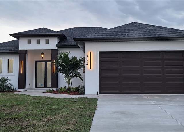 Property at 754 Nimitz Blvd E, Lehigh Acres, FL 33974, 3 beds, 2.5 baths
