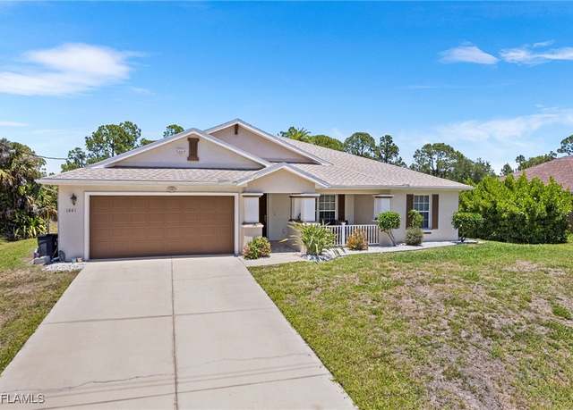 Property at 1061 Lilac St E, Lehigh Acres, FL 33974, 3 beds, 2 baths