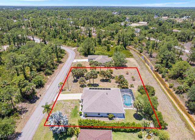 Property at 1061 Lilac St E, Lehigh Acres, FL 33974, 3 beds, 2 baths