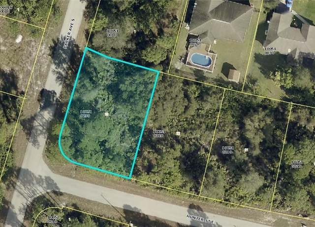 Property at 1017 Hunter St E, Lehigh Acres, FL 33974