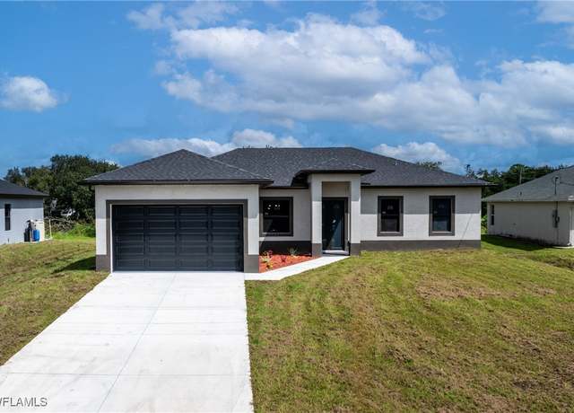 Property at 2602 73rd St W, Lehigh Acres, FL 33971, 3 beds, 2 baths