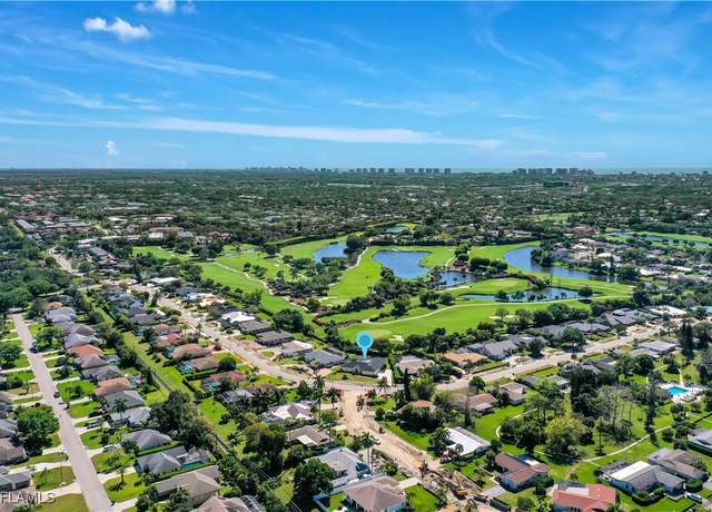 Property at 491 Cypress Way E, Naples, FL 34110, 3 beds, 2.5 baths