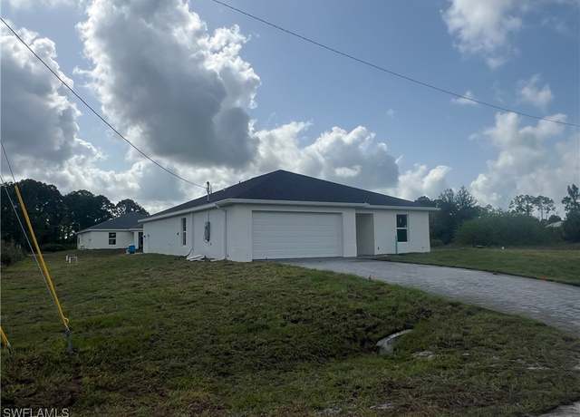 Property at 659 Glenquist Ave S, Lehigh Acres, FL 33974, 4 beds, 2 baths