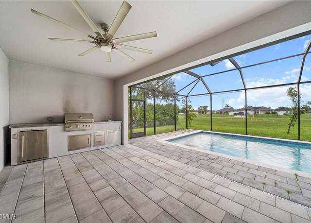 Property at 1010 NE 5th Ave, Cape Coral, FL 33909, 3 beds, 2 baths