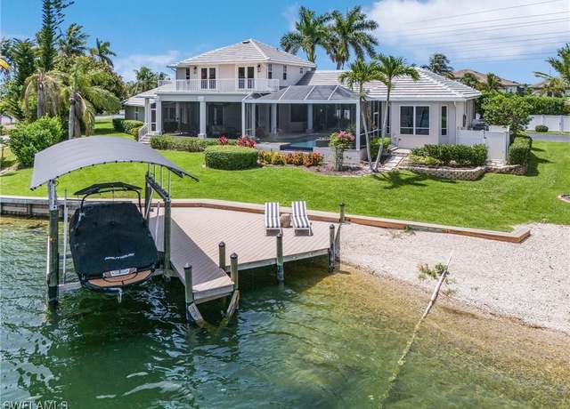 Property at 5870 Harborage Dr, Fort Myers, FL 33908, 4 beds, 3 baths