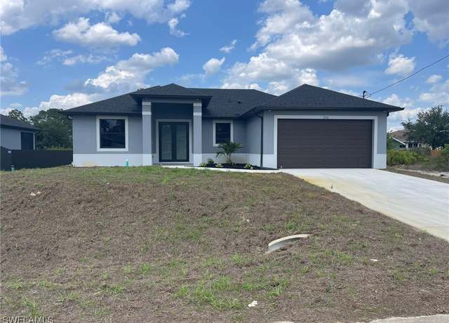 Property at 2710 10th St SW, Lehigh Acres, FL 33976, 3 beds, 2 baths