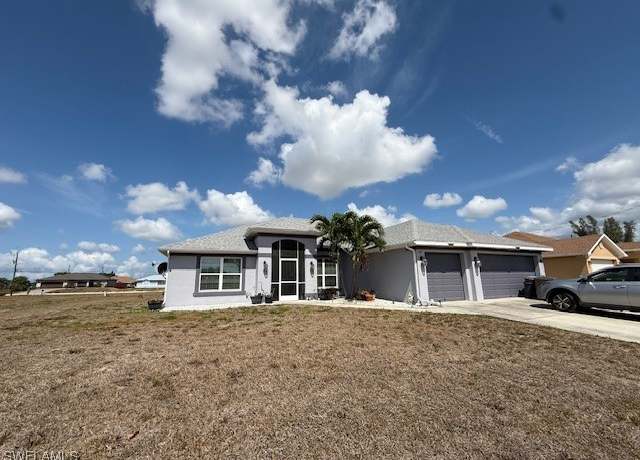 Property at 1426 NE 5th Pl, Cape Coral, FL 33909, 4 beds, 3 baths